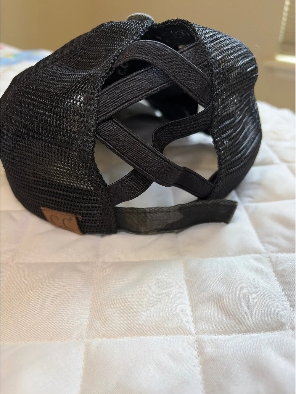 C.C. Distressed Camo Ponytail trucker hat